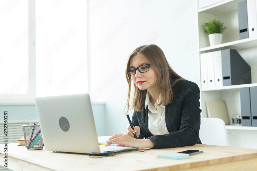 Business, web design and graphic art concept - Beautiful smiling woman in glasses using mouse pan sketch device Business, web design and graphic art concept - Beautiful smiling woman in glasses using mouse pan sketch device