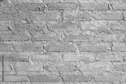 red brick wall texture grunge background with vignetted corners, may use to interior design. Interior design concept, background texture in design use.