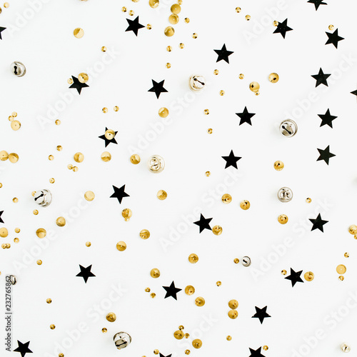 Festive holiday background with sparkle glitter decoration. Flat lay, top view Christmas or New Year pattern. © Floral Deco