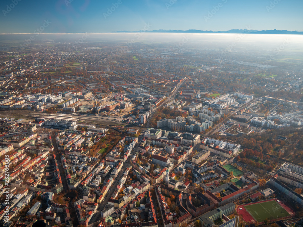 Helicopter view to Munich Region with autumn fog and long view to alps  - obrazy, fototapety, plakaty 