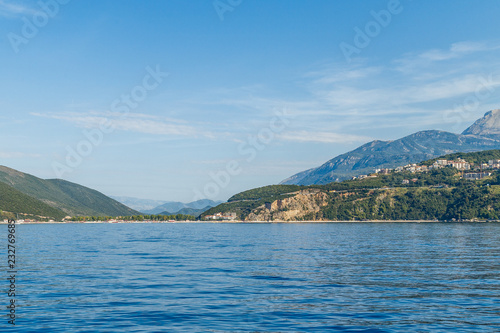 View of the beach Jaz from the sea near the town of Budva © vredaktor