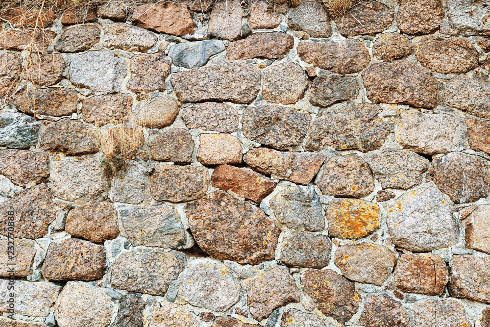 Obraz premium Big stones wall. Old wall of building from stones.