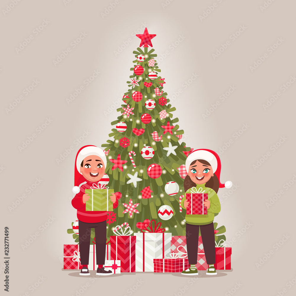 Children and decorated Christmas tree. A boy and a girl are holding gifts. Merry Christmas and Happy New Year Children and decorated Christmas tree. A boy and a girl are holding gifts. Merry Christmas and Happy New Year