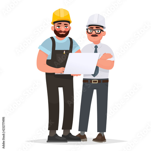 Two men industrial engineers in helmets discussing a project using a laptop. Work in production