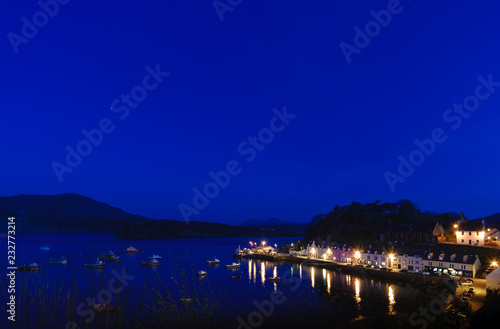Blue hour at the Portree harbor in the Isle of Skye