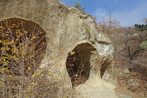 View of the mountain valley, rocks in the Caucasus mountains, stone arch. Kislovodsk resort park, Russia photo