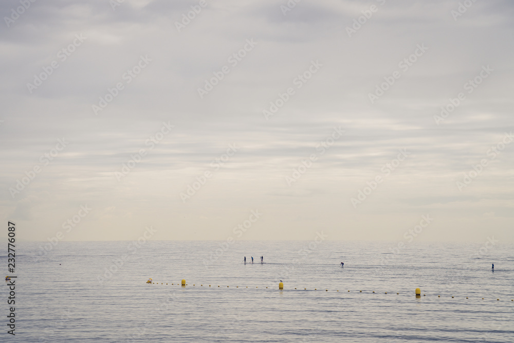 Family of Surfers in Atlantic ocean, Tenerife coast Family of Surfers in Atlantic ocean, Tenerife coast