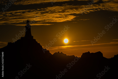Setting sun and Coastal Silhouette, Corbiere, Jersey, Channel Islands