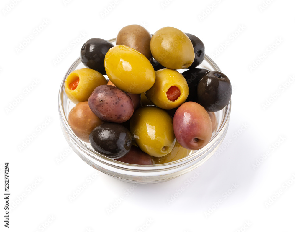 kalamata and conservolia olives in a white bowl isolated against a white kalamata and conservolia olives in a white bowl isolated against a white
