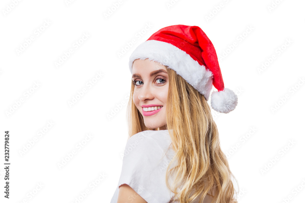 Beautiful portrait of happy smiling Santa girl in red hat and t-shirt on white background with copy space Beautiful portrait of happy smiling Santa girl in red hat and t-shirt on white background with copy space