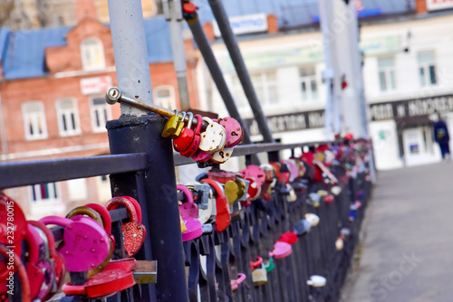 bridge of lovers locks on the railing of the bridge Sunny frosty day