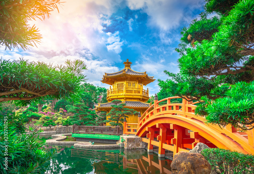 The Golden pavilion and gold  bridge in Nan Lian Garden near Chi Lin Nunnery, famous landmark in Hong Kong.