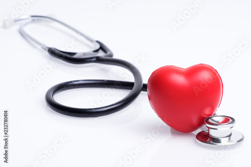 Healthcare or medical concept. Stethoscope and a red heart on a white background.