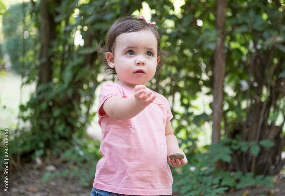 Pretty baby posing in the park Pretty baby posing in the park