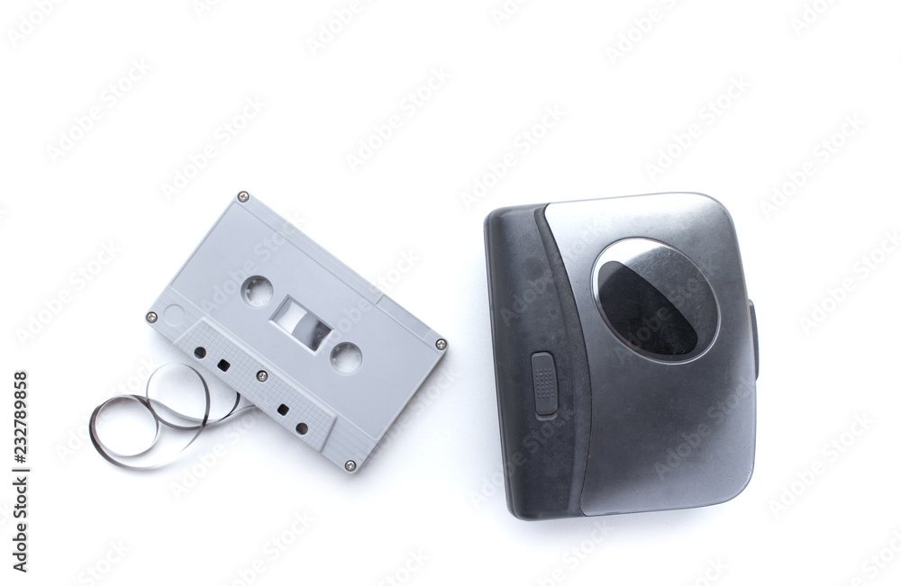 Old cassette player and cassette tape isolated on white background Old cassette player and cassette tape isolated on white background