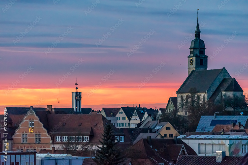 Aerial View of a Town in Germany with a Church and Sunset