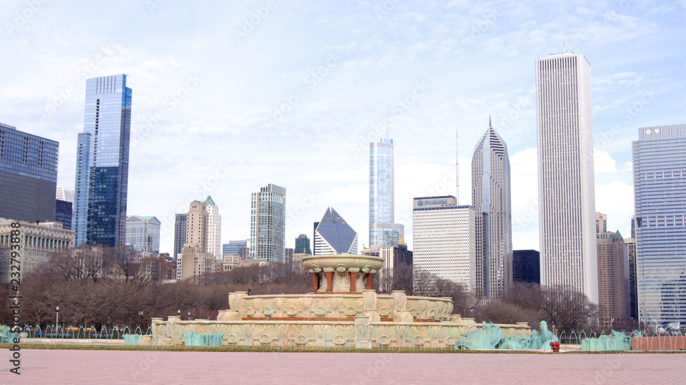 CHICAGO, ILLINOIS, UNITED STATES - DEC 12th, 2015: Buckingham fountain at Grant Park and Chicago downtown skyline