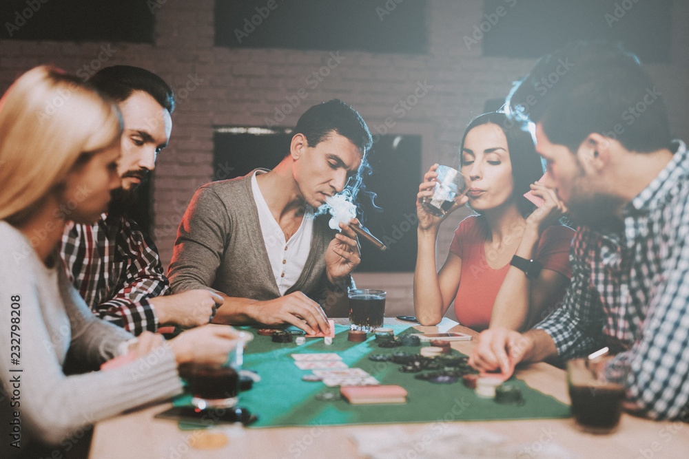 Young Friends Playing Poker on Party at Home. Young Friends Playing Poker on Party at Home.