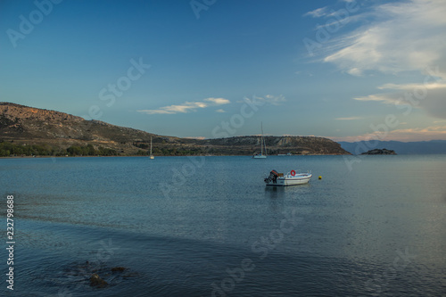 yacht and boat cozy sea bay nature landscape view and calm water surface in twilight evening time