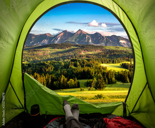 Fototapeta Naklejka Na Ścianę i Meble -  Stunning view from tent to Belianske Tatra mountains at sunset