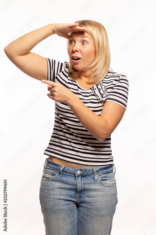 Young woman looks into the distance in surprise, emotional portrait, isolated on white background Young woman looks into the distance in surprise, emotional portrait, isolated on white background
