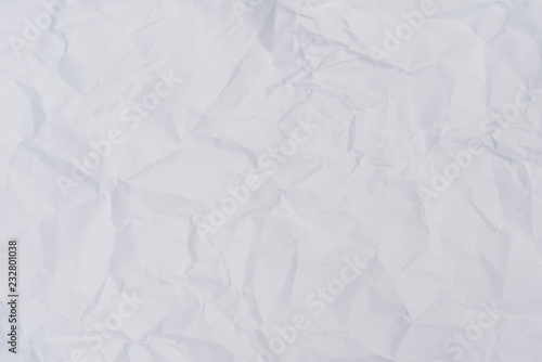 White crumpled paper background and texture, Wrinkled creased paper white abstract.Abstract white crumpled paper background.