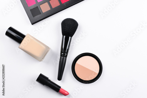 Professional makeup products with cosmetic beauty products, foundation, lipstick, eye shadows, eye lashes, brushes and tools.