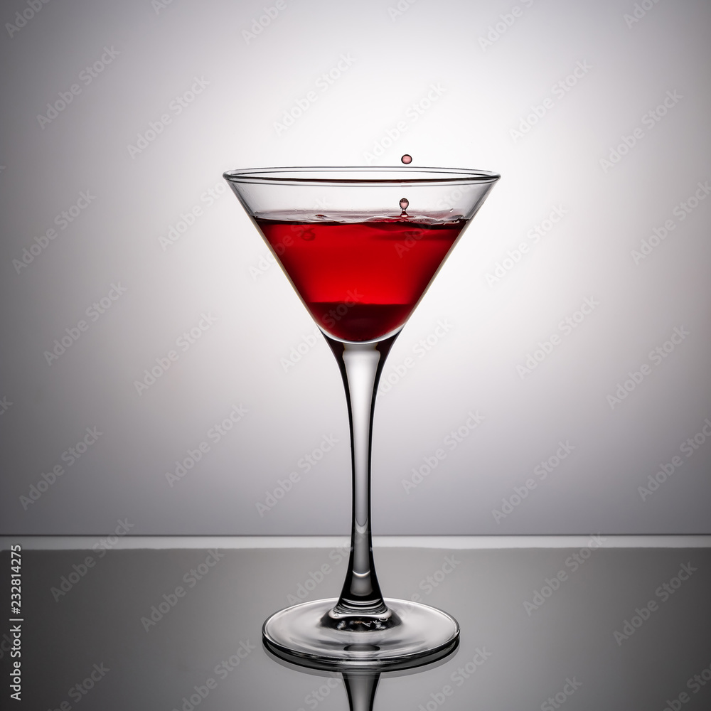 glass of wine on the glass table glass of wine on the glass table
