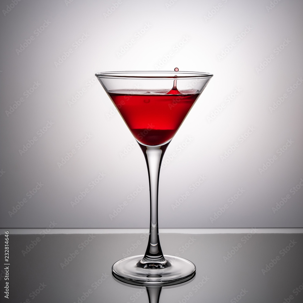 glass of wine on the glass table glass of wine on the glass table