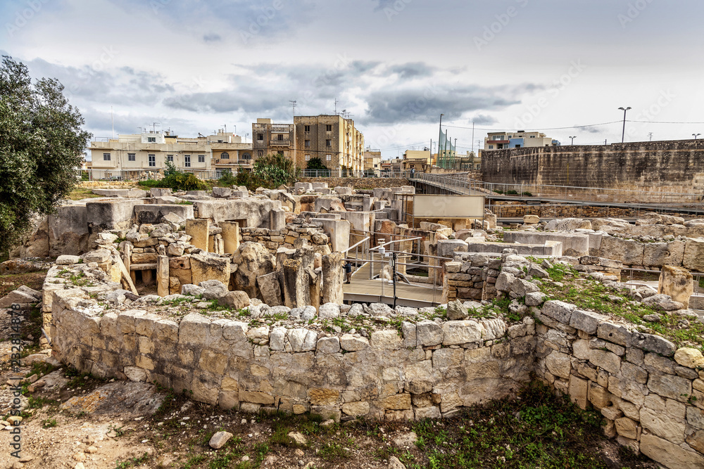 HAGAR QIM, MALTA - NOV 11, 2012: Hagar Qim, ancient Megalithic Temple of Malta, is a unesco world heritage site on the island nation of Malta.