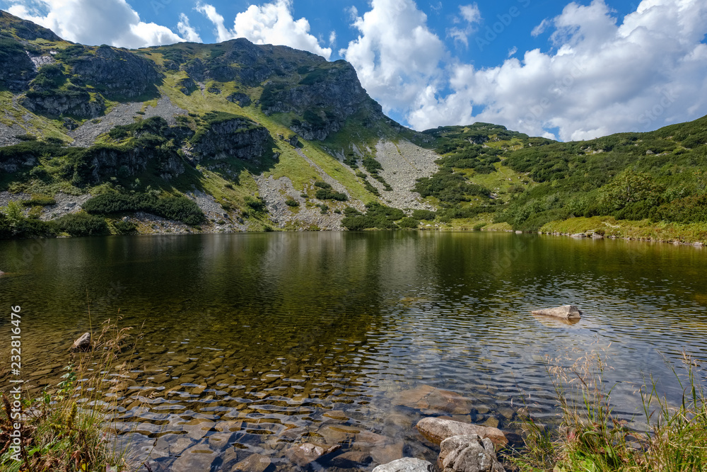 mountain lake in late summer in Slovakian Carpathian Tatra mountain lake in late summer in Slovakian Carpathian Tatra