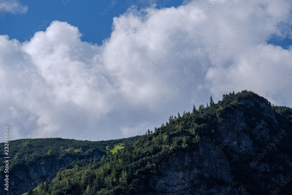 mountain top panorama in autumn covered in mist or clouds mountain top panorama in autumn covered in mist or clouds