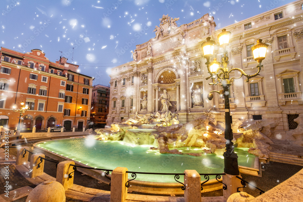 restored Fountain di Trevi in Rome with snow, Italy
