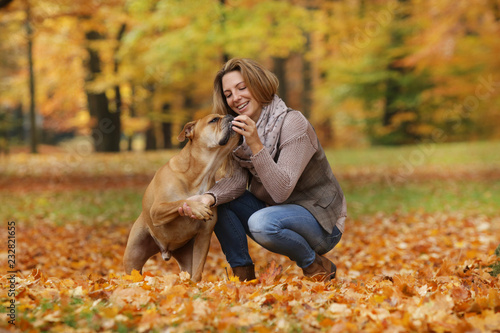 woman and dog doing commands