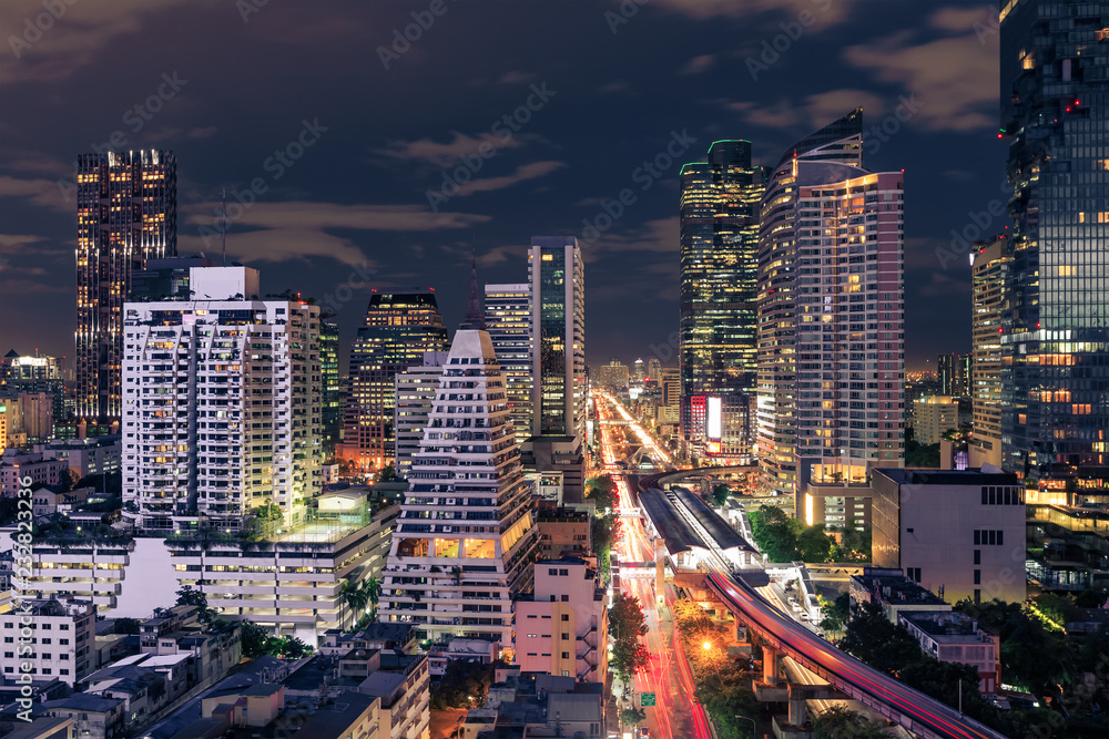 Obraz premium Bangkok business district cityscape with skyscraper at night, Thailand
