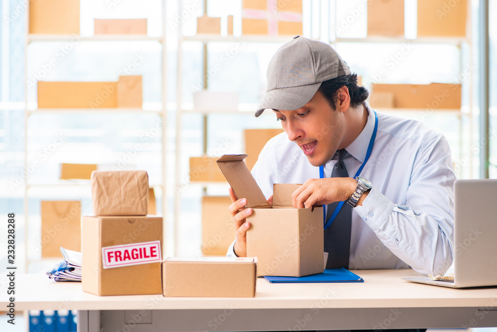 Male employee working in box delivery relocation service Male employee working in box delivery relocation service