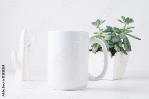 white mug mockup in a styled setting with a white background photo