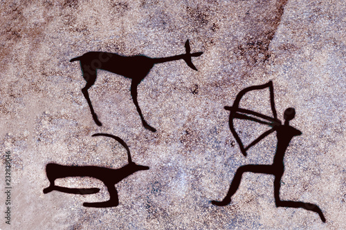 image of an ancient hunter with a bow and animals on the cave wall. ancient history, archaeology.