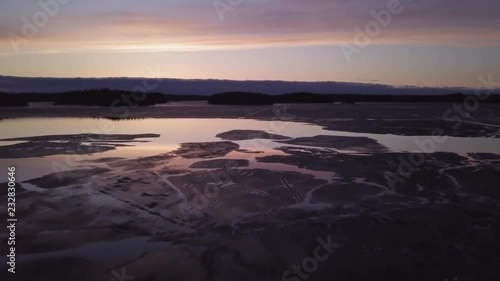 Aerial view of springtime sunset lake photo