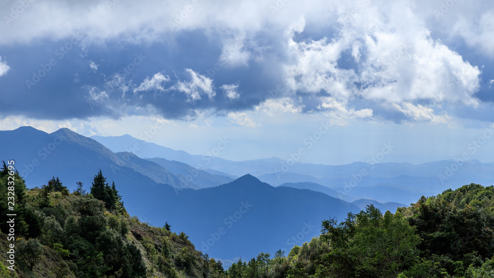 Misty mountain range at Doi Inthanon in Chaing Mai, north of Thailand Misty mountain range at Doi Inthanon in Chaing Mai, north of Thailand