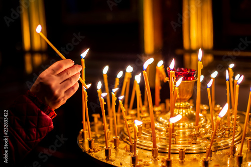 candles are in candlesticks in the temple