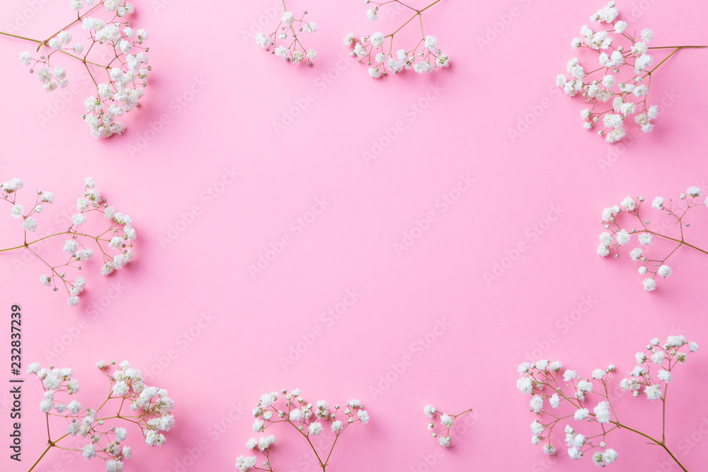 Frame of white flowers, gypsophila, Baby's Breath. Flat lay composition. Romantic concept. Top view. Copy space.