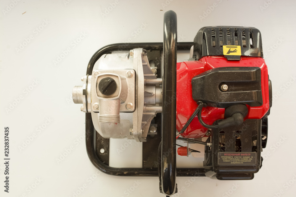 Fototapeta premium on a blue background motor pump, top view