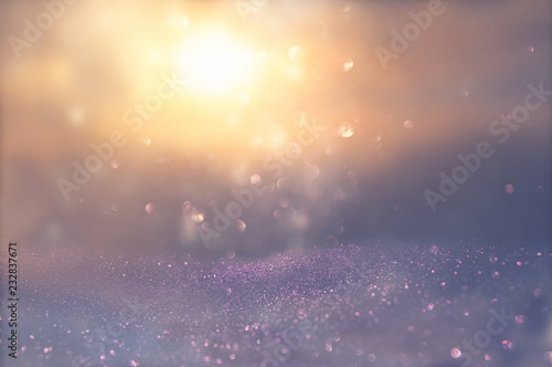 glitter vintage lights background. silver, blue, purple and gold. de-focused. © tomertu