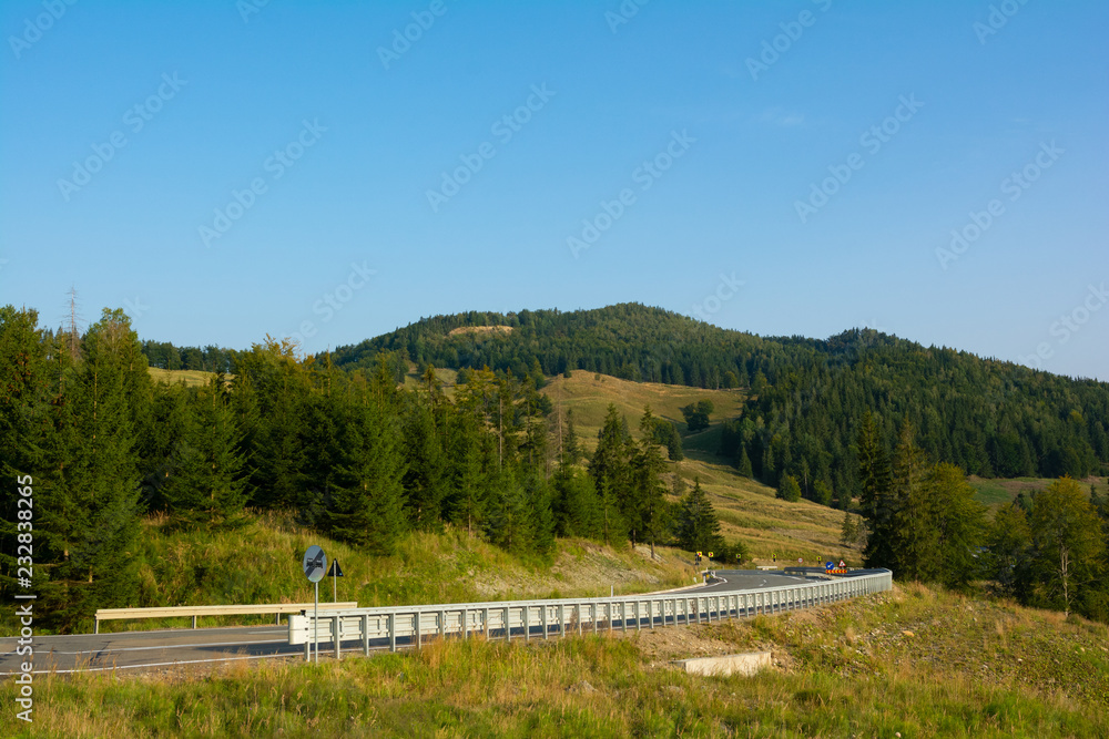 Beautiful view of highway in Putna-Vrancea natural park in Romania, Europe. Carpathian mountains Beautiful view of highway in Putna-Vrancea natural park in Romania, Europe. Carpathian mountains
