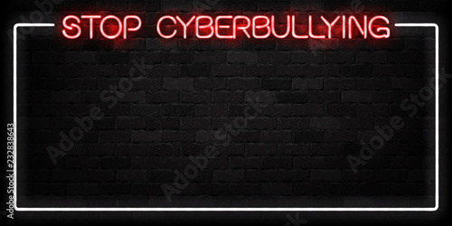 Vector realistic isolated neon sign of Stop Cyberbullying frame logo for decoration and covering on the wall background.