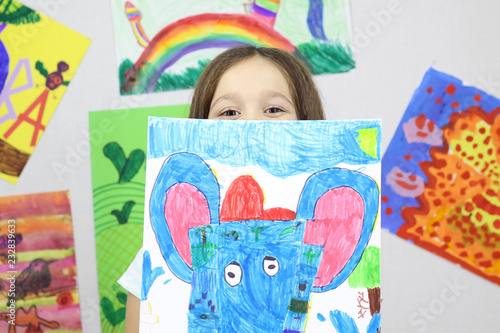 child artist, little girl drew a picture of the God Ganesha