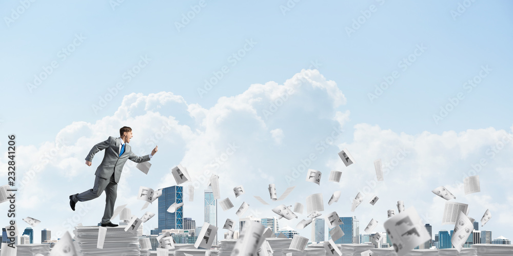 Precise businessman in suit running with phone. Precise businessman in suit running with phone.