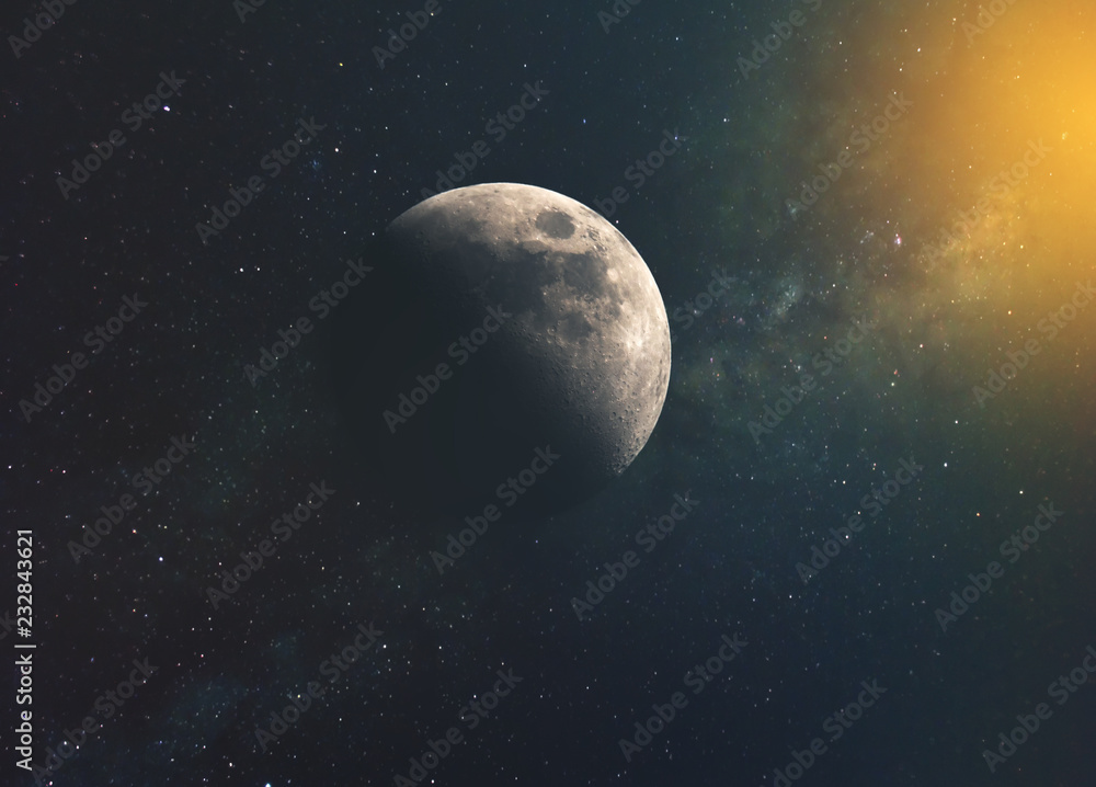 Obraz premium the moon against the milky way and the rays of the sun in the infinite space of the universe