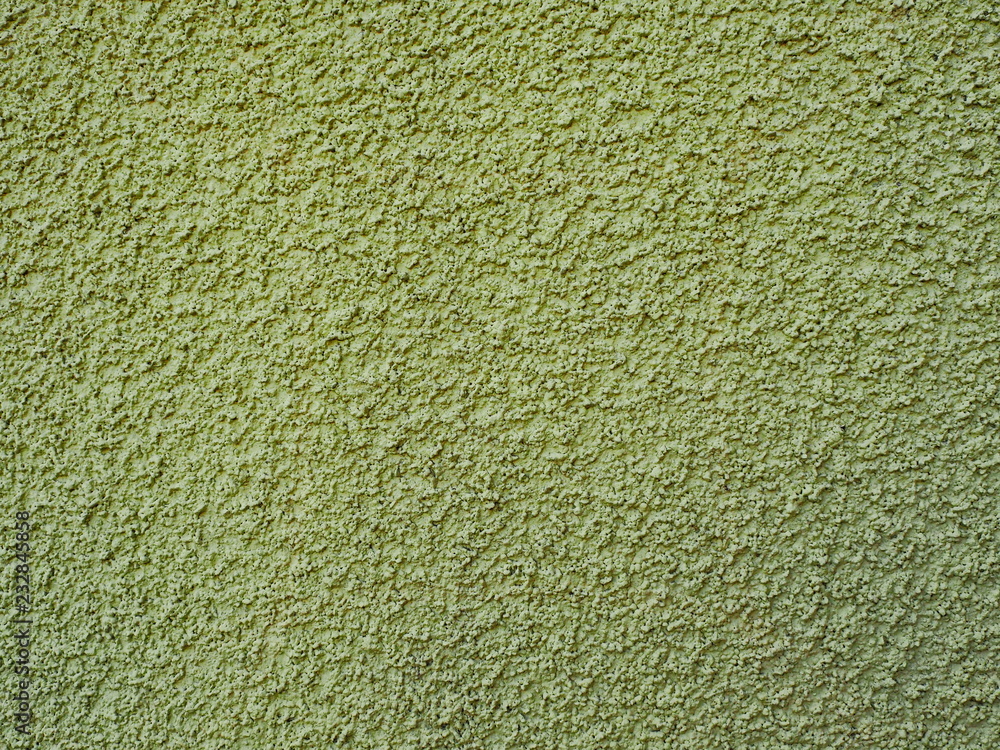 Fototapeta premium granular light green wall